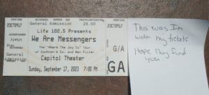 Concert tickets with a note